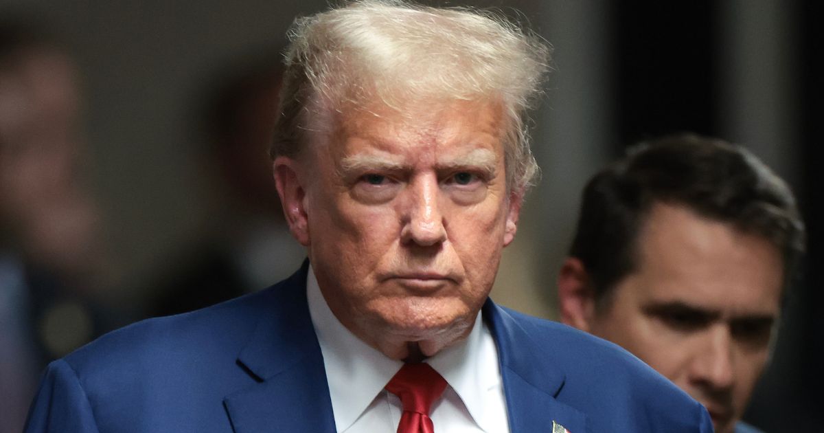 Former President Donald Trump walks to speak to members of the media at the end of the day at his trial at Manhattan Criminal Court in New York City on Monday.