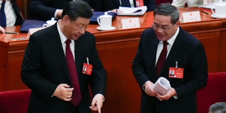 Xi Jinping chatting after the opening session of the National People's Congress in Beijing