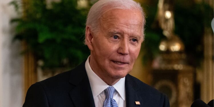 President Joe Biden speaks during the Presidential Medal of Freedom ceremony in the East Room of the White House in Washington, D.C., on Friday.