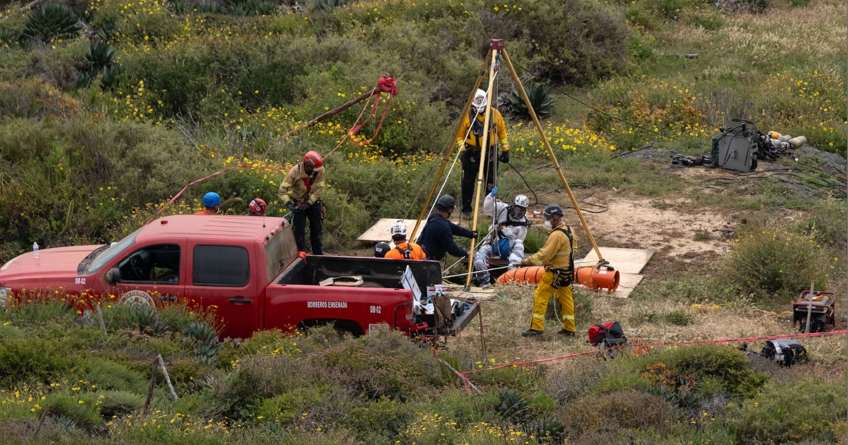 Investigators on the scene at a well on Friday in the Mexican state of Baja California where the bodies of a missing American and two Australian brothers were found.