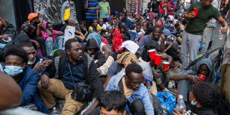 A multitude of recently arrived illegal immigrants to New York City camp outside of the Roosevelt Hotel on Aug. 1, 2023.