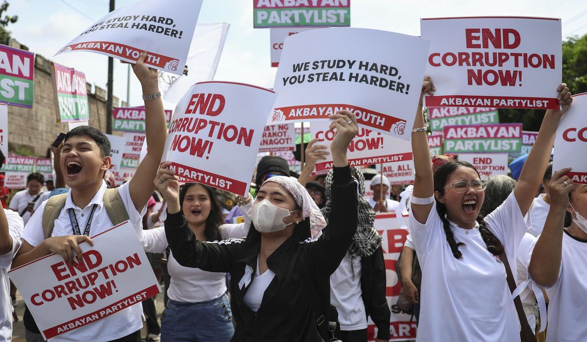 Police in Philippines arrest 17 for hurling rocks as thousands peacefully protest corruption