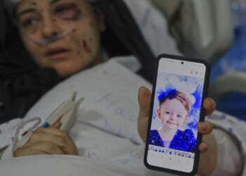 Lebanese village mourning children and father killed in Israeli strike