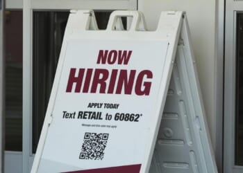 Fewer Americans file for jobless benefits despite signs of a slowing labor market