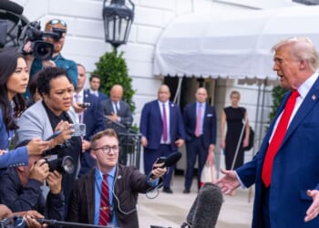 President Donald Trump talks to the media before boarding Marine One on the South Lawn of the White House on Sept. 21, 2025, in Washington, D.C.