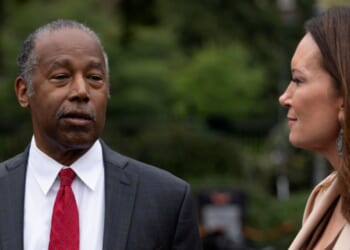 Ben Carson speaks with reporters as Agriculture Secretary Brooke Rollins listens outside the White House in Washington, D.C., on Wednesday.