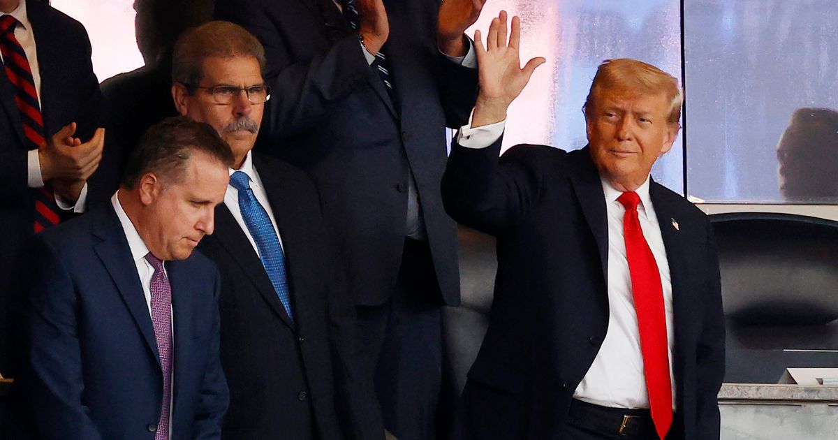 President Donald Trump waves as he attends the New York Yankees game against the Detroit Tigers at Yankees Stadium on Sept. 11, 2025, in New York City.