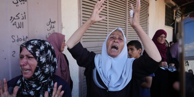 Israel strikes in Gaza kill at least 16 Palestinians as Hamas mulls its response to Trump's plan