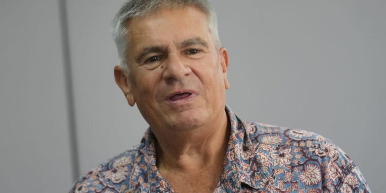 Australian man says he was improperly arrested in Thailand over his criticism of Malaysia