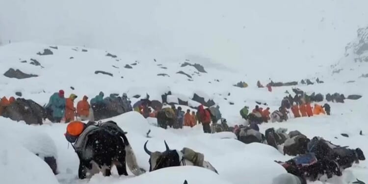 Rescuers in India search for missing people after landslides kill 24 in Darjeeling region