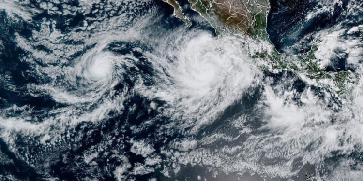 Hurricane Priscilla strengthens to a Category 2 storm as it moves along the Pacific coast of Mexico