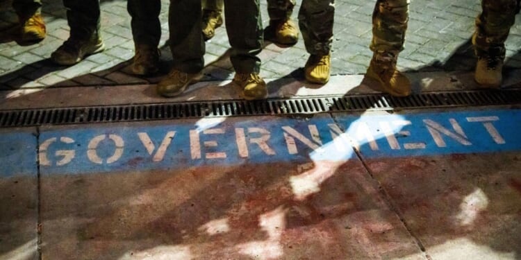 Appeals court allows Trump to federalize National Guard troops but not deploy them yet