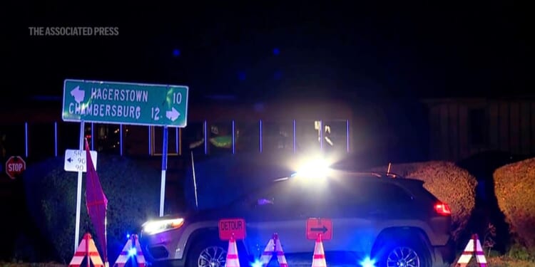 Two Pennsylvania state police officers are shot in exchange of gunfire with suspect who was killed