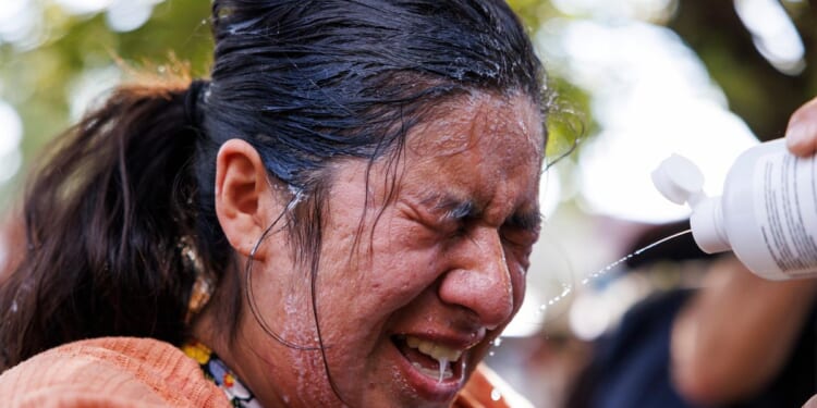 Judge tells feds to restrict use of tear gas, other riot controls in Illinois