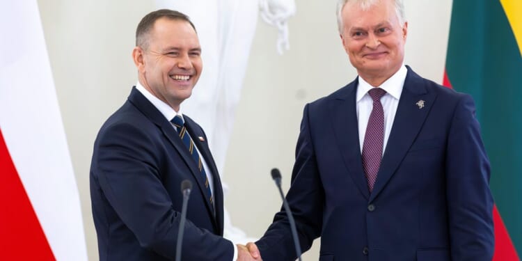 New road linking Baltic states to Poland opens at a time of tensions with Russia