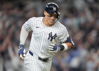 New York Yankees' Aaron Judge reacts as he rounds the bases after hitting a three-run home run against the Toronto Blue Jays during the fourth inning of Game 3 of baseball's American League Division Series in New York on Tuesday.
