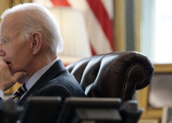 President Joe Biden listens during a briefing in the Oval Office of the White House in Washington, DC on Jan. 10, 2025.