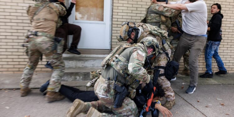 CBP official defends use of tear gas in Chicago and says agents on immigration sweeps have cameras