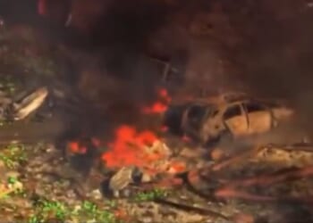 Debris burns where a blast levelled an explosives factory in Tennessee Friday morning.