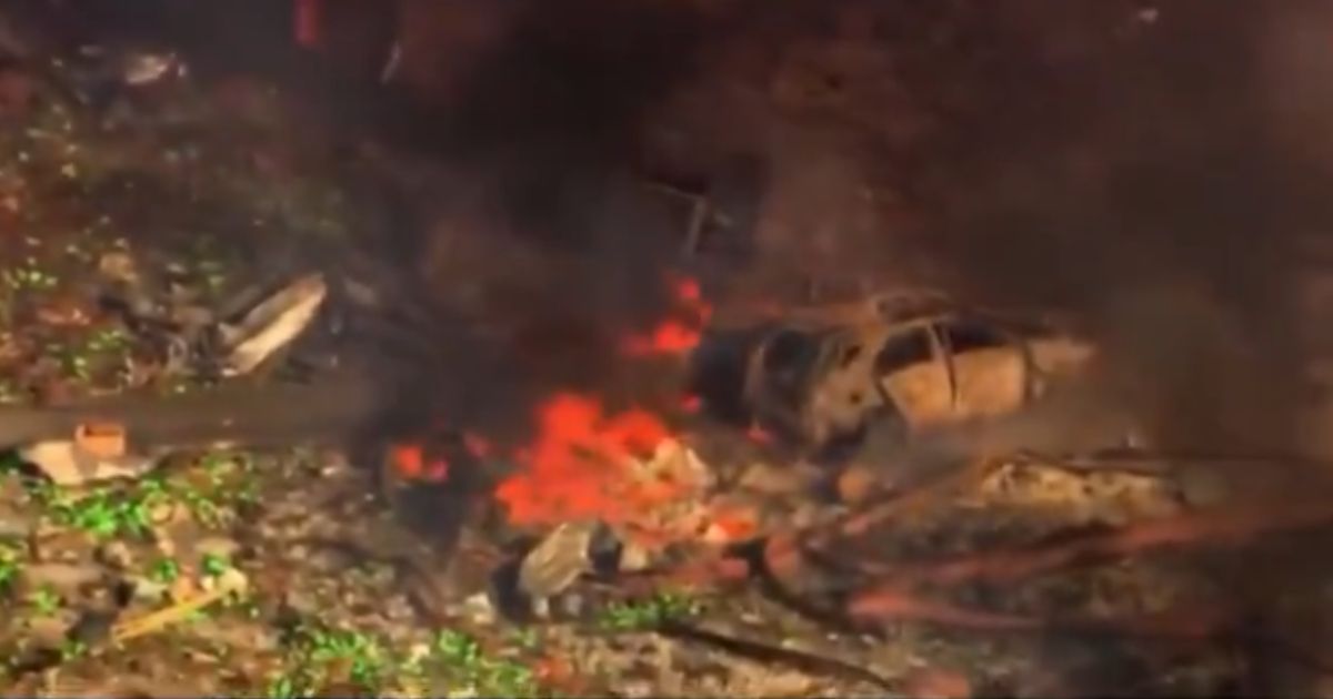 Debris burns where a blast levelled an explosives factory in Tennessee Friday morning.