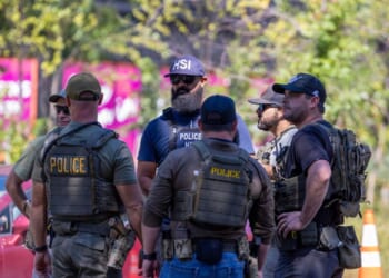Washington D.C. Metro Police, ICE, and HSI Agents conduct a roadblock and check drivers for infractions on Georgia Avenue on Aug. 30, 2025, in Washington, D.C.