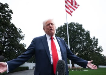 President Donald Trump speaks to the media as he departs the White House in Washington, D.C., on Tuesday.