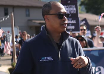 Virginia Democratic AG candidate Jay Jones marches in the 54th Annual Buena Vista Labor Day Festival parade in Buena Vista, Virginia, on Sept. 1.