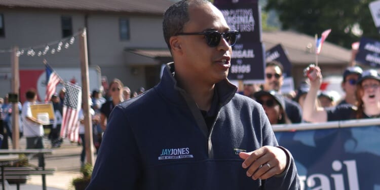Virginia Democratic AG candidate Jay Jones marches in the 54th Annual Buena Vista Labor Day Festival parade in Buena Vista, Virginia, on Sept. 1.