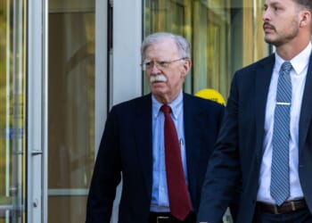 Former U.S. National Security Advisor John Bolton leaves federal court after pleading not guilty to charges of mishandling classified material on Oct. 17, 2025, in Greenbelt, Maryland.