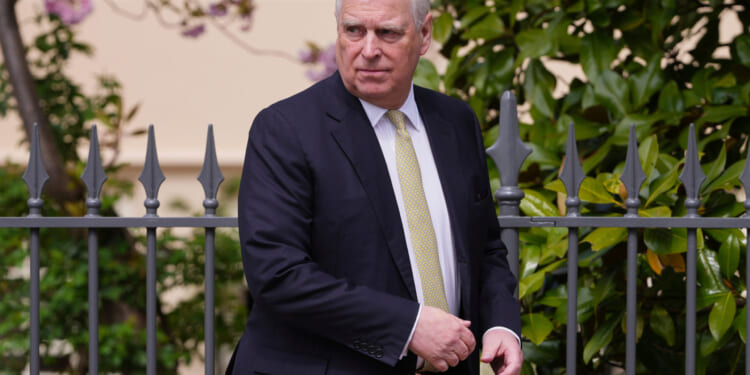 Prince Andrew looks around as he leaves after attending the Easter Matins Service at St. George's Chapel, Windsor Castle, England, on April 20, 2025.