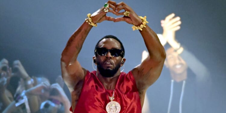 Sean "Diddy" Combs, seen performing at the 2023 MTV Video Music Awards, was sentenced Friday to 50 months in prison.