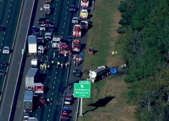 A tractor-trailer driver is facing multiple charges, including eight counts of vehicular homicide, after an Oct. 13, 2025, crash on Interstate 85 in Jackson County, Georgia.