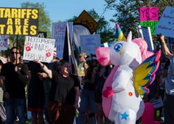 Demonstrators participate in the second "No Kings" protest Saturday in Thousand Oaks, California.