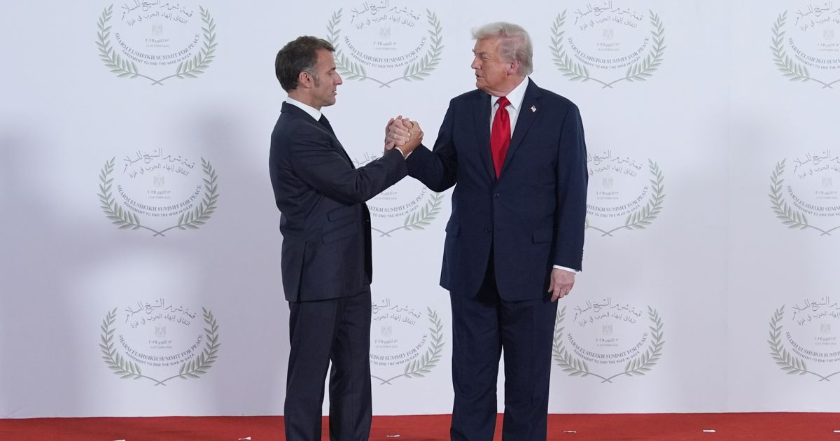 President Donald Trump greets France's President Emmanuel Macron during a summit of European and Middle Eastern leaders on Oct. 13, 2025, in Sharm El Sheikh, Egypt.