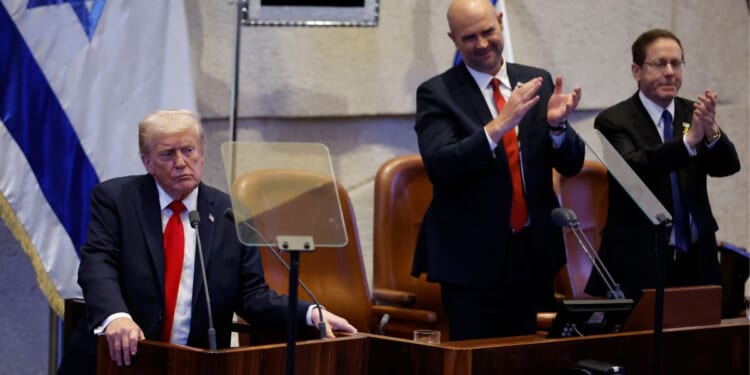 President Donald Trump, left, address the Israeli Knesset in Jerusalem on Monday.