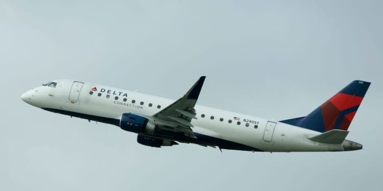 A Delta Connection Embraer E175LR departs San Diego International Airport on Aug. 15, 2025, in San Diego, California.
