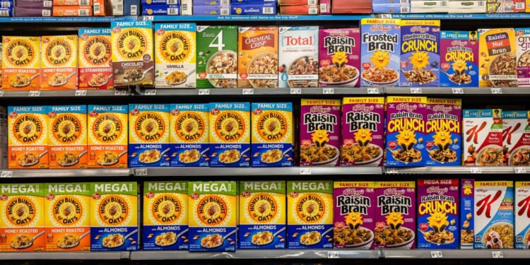 Boxes of cereal from several brands, including Honey Bunches and Kelloggs, on the shelves of a Walmart store in Florida City, Florida, on Aug. 5, 2025.