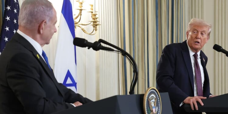 President Donald Trump speaks with Israeli Prime Minister Benjamin Netanyahu during a joint news conference in Washington, DC, on Sept. 29, 2025.