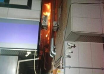 A new mother died in a fire set by a neighbor who was reportedly trying to kill a cockroach.