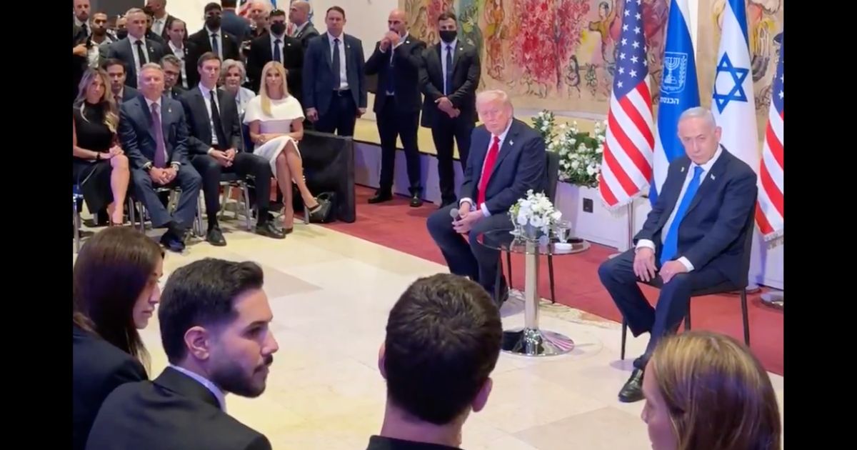 President Donald Trump listens to the families of the hostages of Hamas after he helped ensure the return of those still living via a peace deal on Oct. 13, 2025.