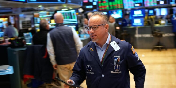 Wall Street gaining ground amid steady flow of earnings reports, upbeat economic updates
