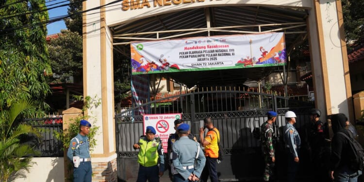 Several explosions shake a mosque in an Indonesian high school and injure 55