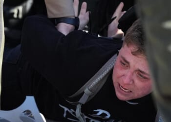 Protesters arrested, officers injured Friday in clash outside Chicago-area immigration facility