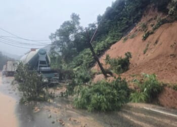 Heavy rain triggers landslides and floods in central Vietnam, killing seven