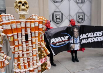 Judge OKs opioid settlement for Purdue Pharma and Sackler family members who own the company
