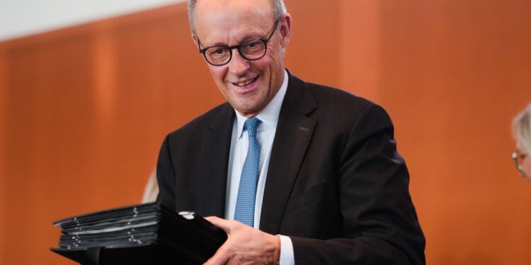 German leader downplays Brazil remarks after criticism