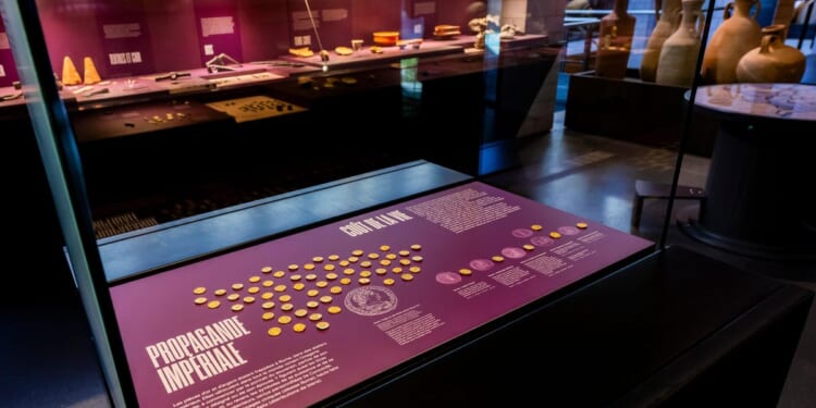 Two robbers overpower a guard and steal dozens of ancient gold coins from a Swiss museum