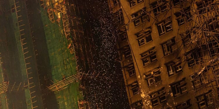 Hong Kong fire raises questions on use of iconic bamboo scaffolding