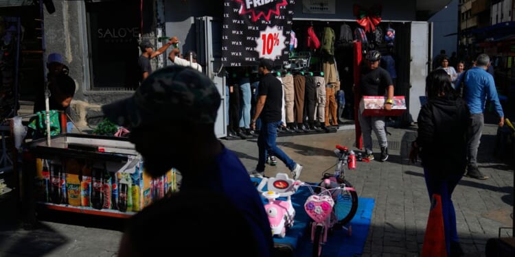 Venezuelans concerned about economic turmoil shun deals on Black Friday
