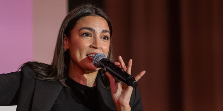 Rep. Alexandria Ocasio-Cortez departs from a town hall gathering on May 2, 2025, in New York City.